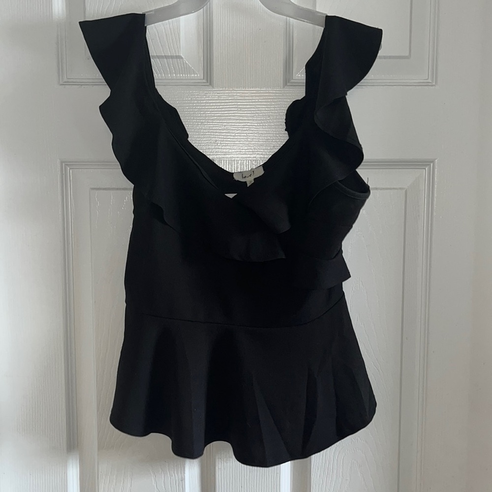 The blouse is exlarge but runs small may fit a large or medium